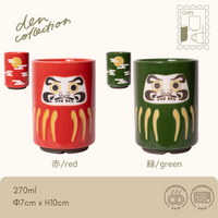 Daruma Spirit Tea Cups – Japanese yunomi in red and green featuring traditional daruma doll design, symbolizing perseverance and good fortune. Porcelain, microwave and dishwasher safe. / 縁起の良いだるま柄の赤・緑 湯呑み。努力と運を象徴する日本の伝統モチーフ。電子レンジ・食洗機対応の磁器製。
