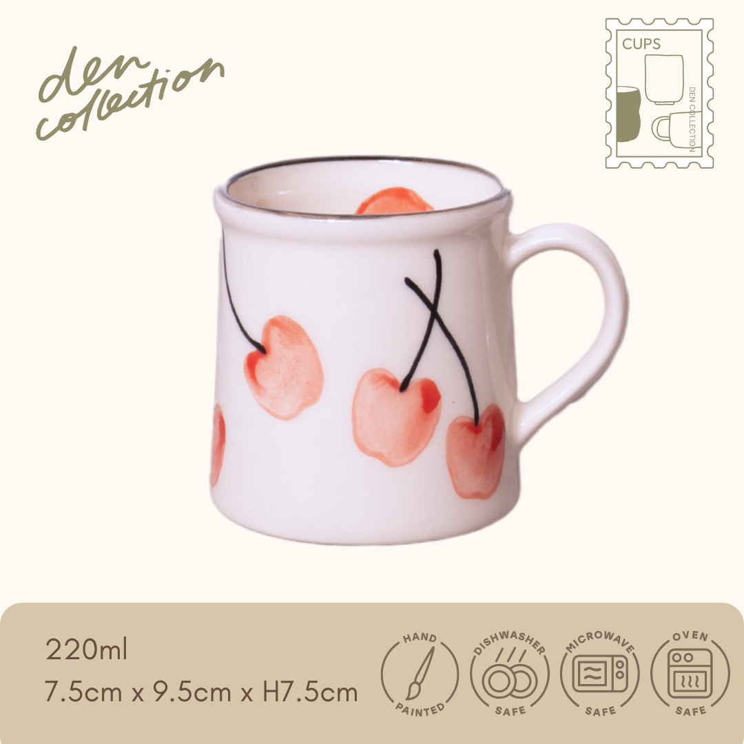 Hand-painted Fruity Basket mug with charming cherry illustrations, evoking a sweet and whimsical style. / 手描きのさくらんぼ柄が可愛い萬古焼のFruity Basketマグカップ（さくらんぼ）。遊び心あるデザインです。