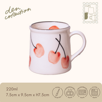 Hand-painted Fruity Basket mug with charming cherry illustrations, evoking a sweet and whimsical style. / 手描きのさくらんぼ柄が可愛い萬古焼のFruity Basketマグカップ（さくらんぼ）。遊び心あるデザインです。