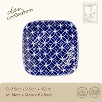 Wa‑Mon Square Plate – Shippo seven treasures circular pattern Japanese ceramic plate in indigo. Symbol of harmony, abundance, and spiritual connection.  
藍和紋角皿（七宝柄）。藍色の七宝文様を描いた日本製角皿。調和と豊穣、縁を紡ぐ吉祥文様として知られます。
